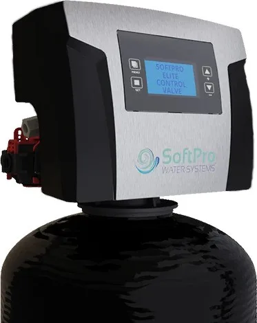 A close-up of a SoftPro Elite water filtration system control valve with a digital display on a black cylindrical tank.